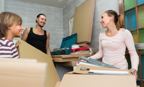 Office removals planning in Hammersmith with moving boxes and desks