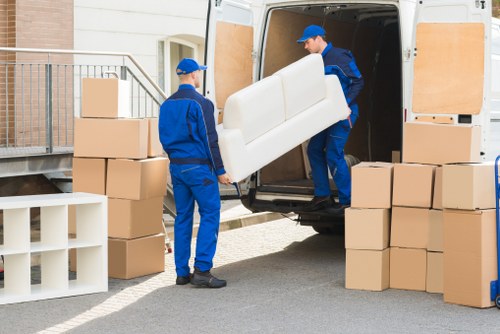 Organised moving boxes prepared for a West London flat relocation