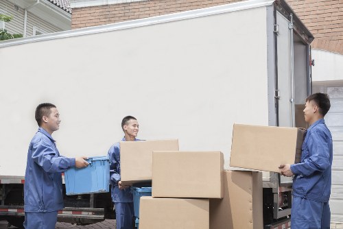 Man and van loading furniture in Hammersmith street