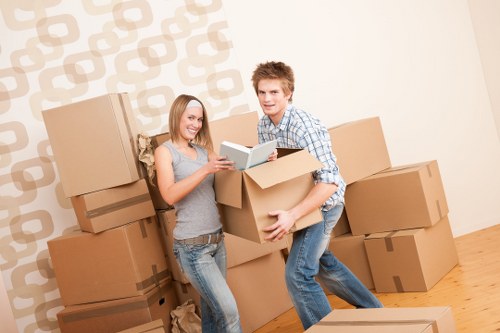 Experienced packers organizing fragile items during a move