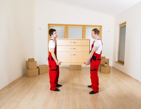A removals team navigating a residential street in Hammersmith