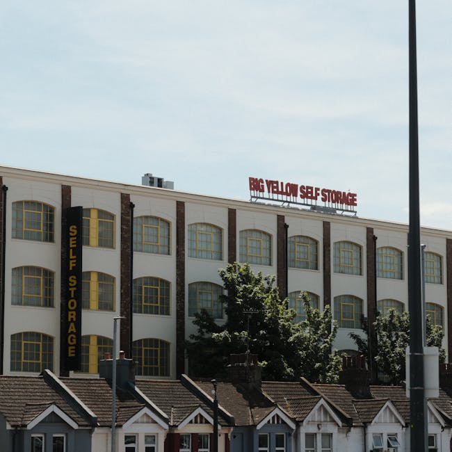 This image shows the front facade of a brick residential building located on Melbourne Terrace, SW6, with two white-framed windows on the upper floor and two doors on the ground level, each beneath a
